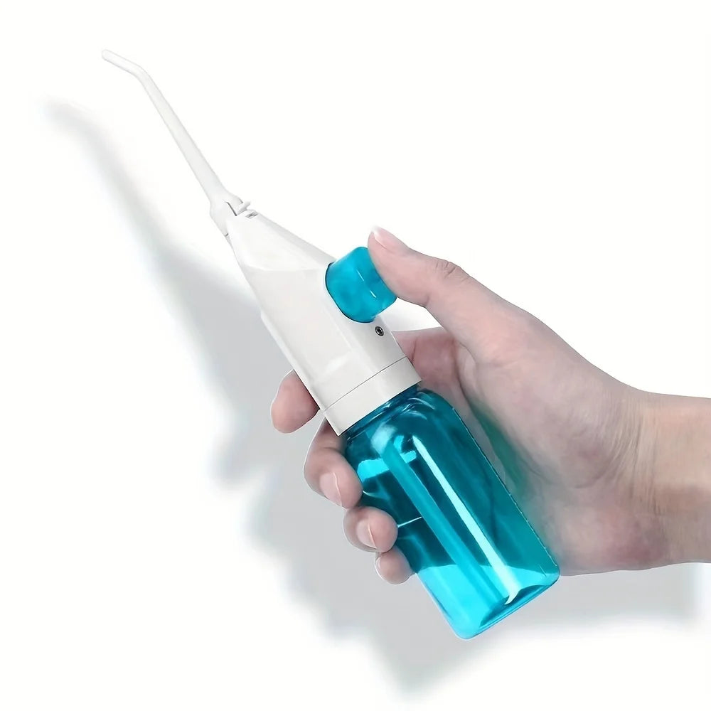 Portable Manual Oral Irrigator Water Flosser