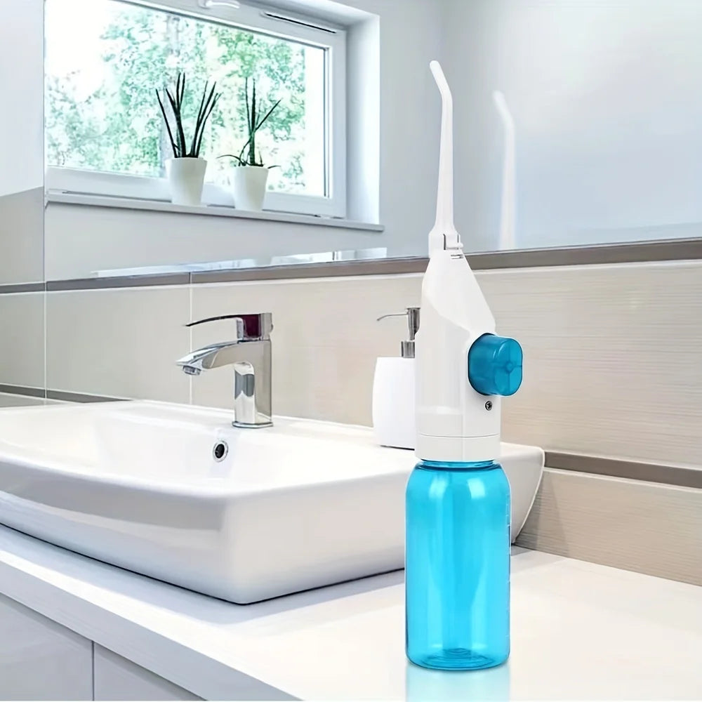 Portable Manual Oral Irrigator Water Flosser